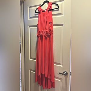 SANGRIA sleeveless feminine dress with beautiful bodice design.